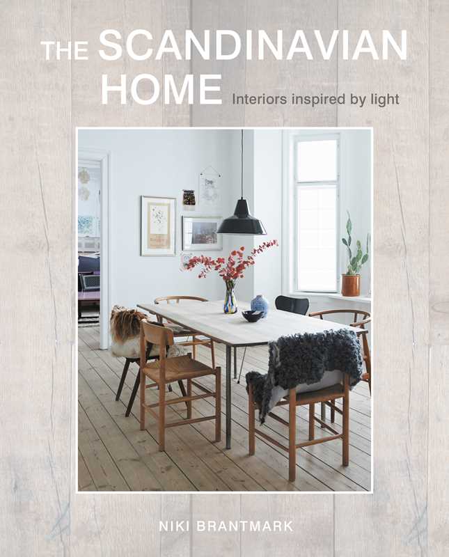 Cover of Book: Scandinavian Home Interiors Inspired by Light by Niki Brantmark, depicting a minimalist dining room with wooden chairs and a pendant lamp, highlighting elegant Scandinavian interiors filled with natural light.