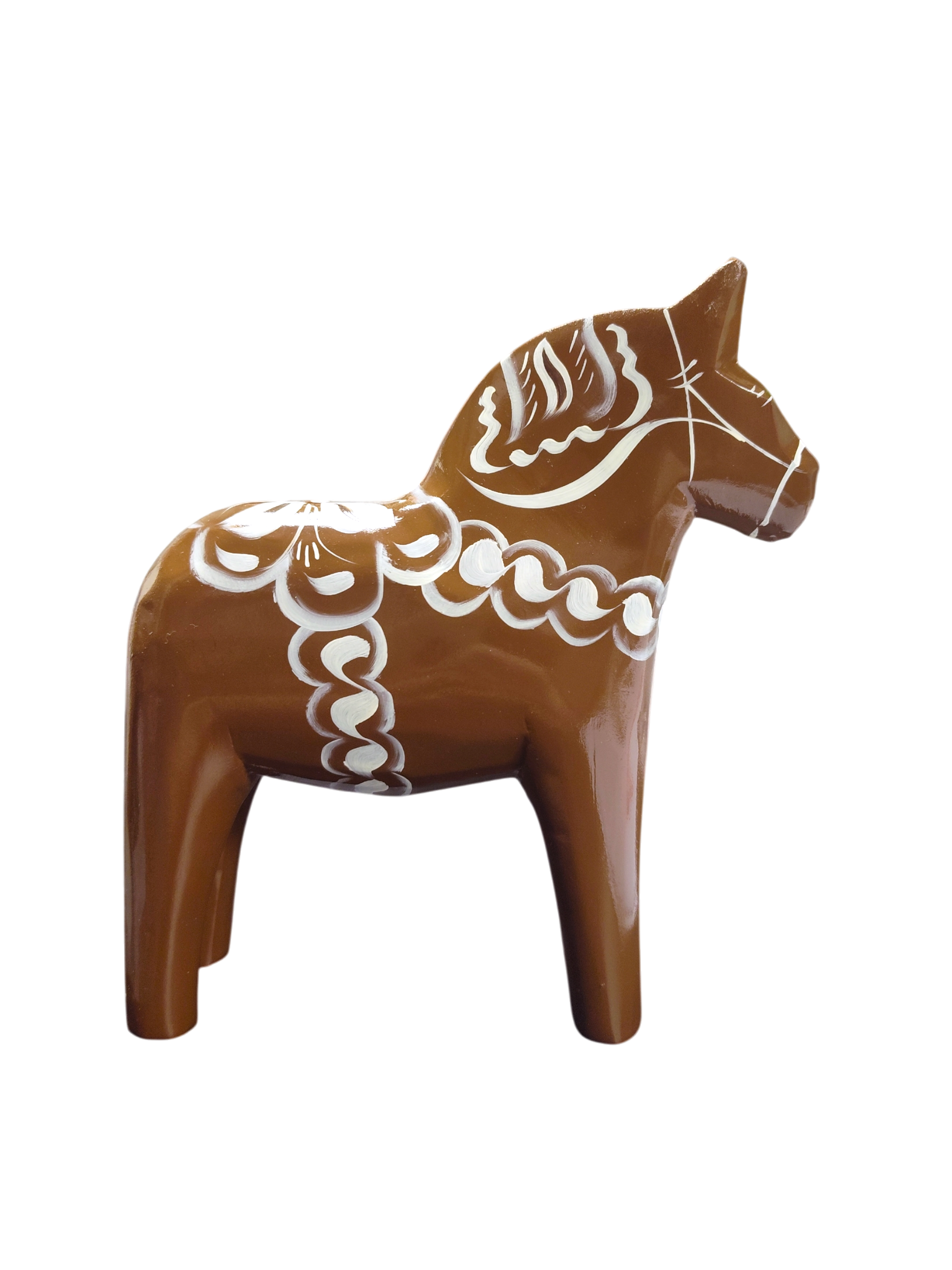 The Dala Horse: Swedish Dala Horse Brown with White Kurbits is a handcrafted Swedish pine figurine, painted brown with white kurbits patterns, shown in profile against a plain white background.