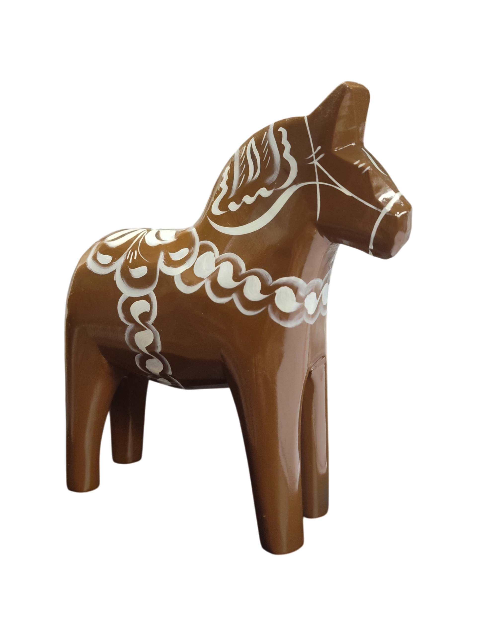 The Dala Horse: Swedish Dala Horse Brown with White Kurbits is a handcrafted brown wooden figurine featuring white decorative patterns, inspired by traditional Swedish folk art. Made in Sweden.