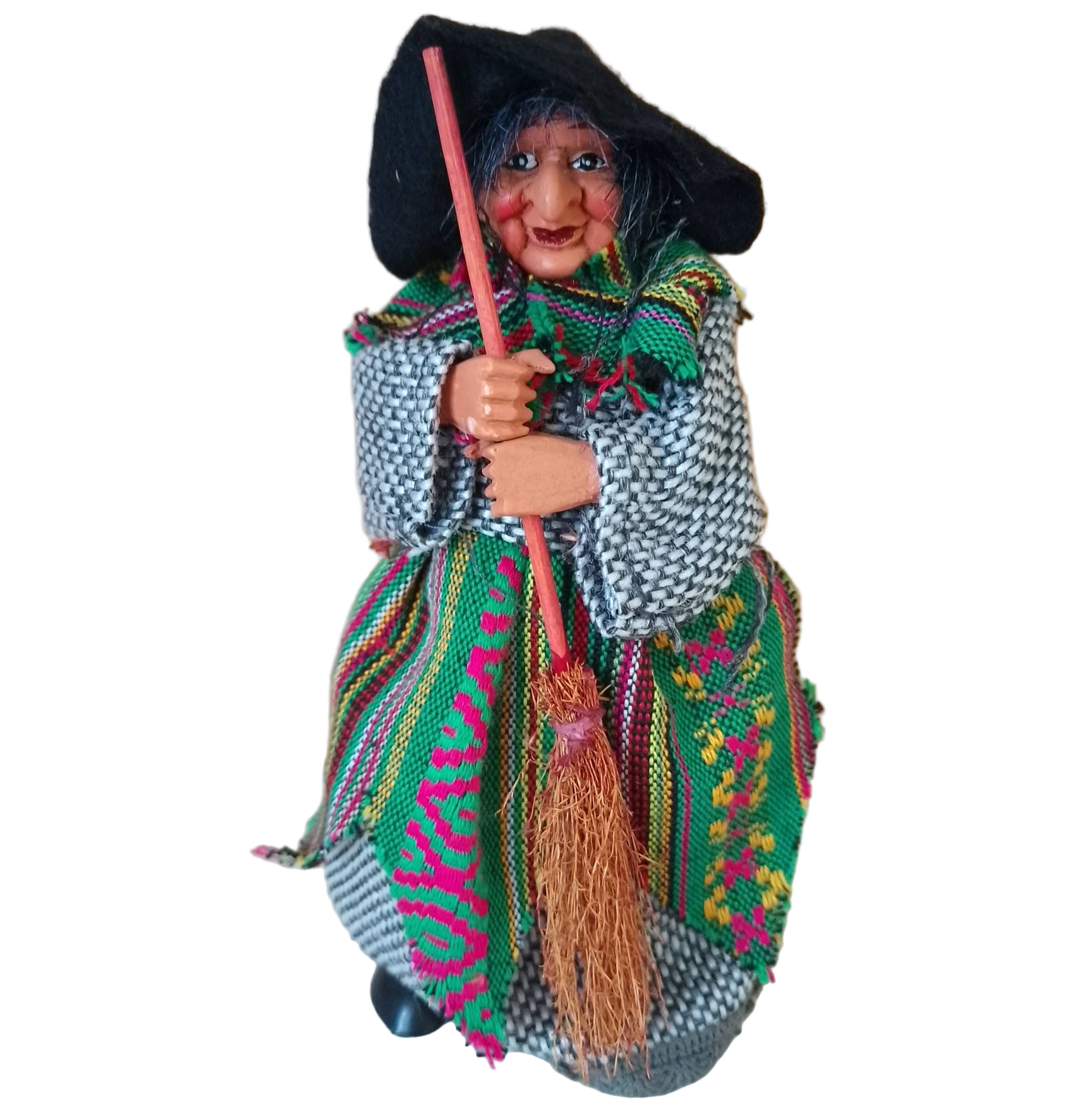 The Yasmina Green Kitchen Witch Doll Figurine (7" tall, standing base) wears a black hat, colorful shawl, and striped skirt while holding a broom—an enchanting folklore charm for kitchen protection and good luck.
