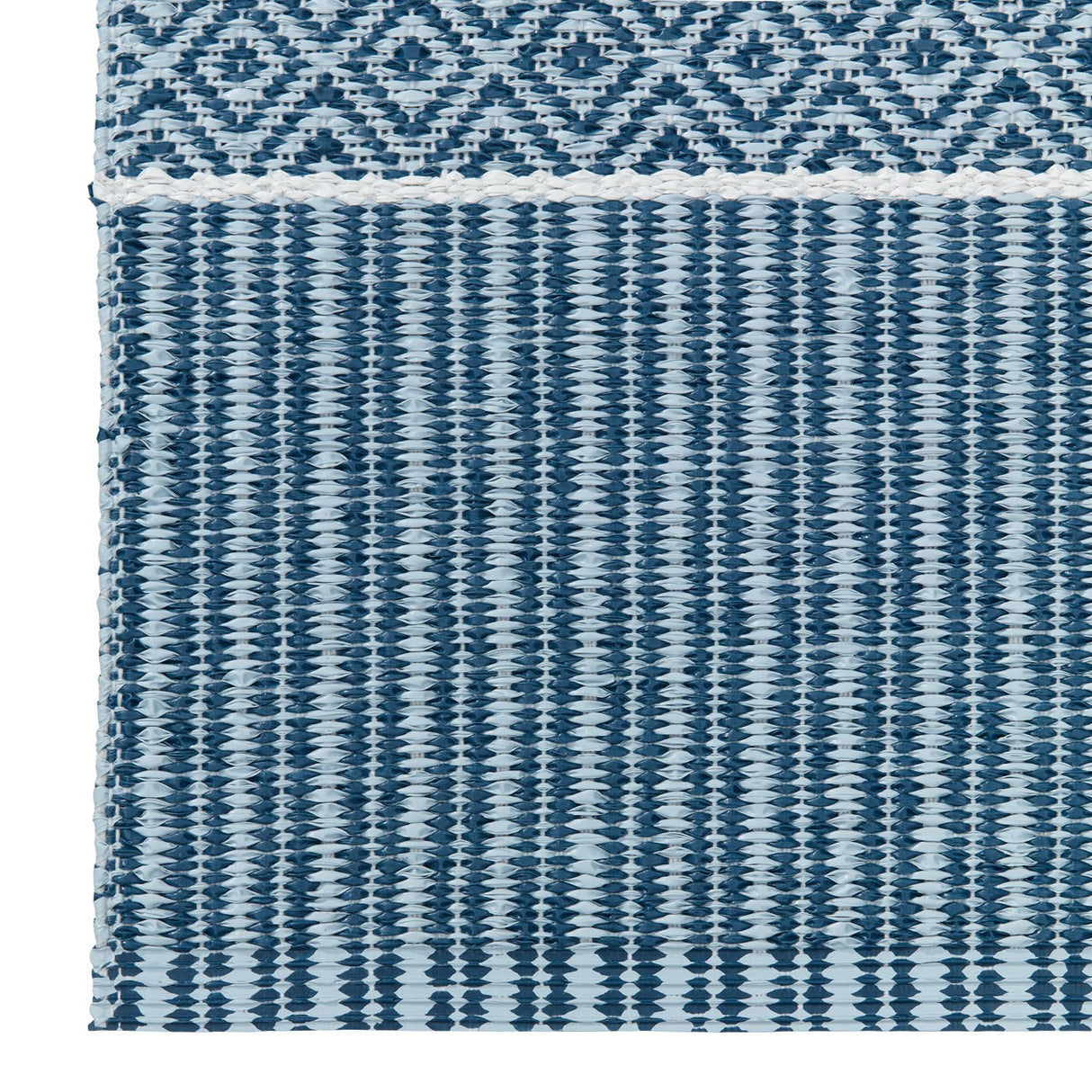 Close-up of the Alfie Blue Vinyl Rug by Horredsmattan. Featuring a lower section with vertical stripes and an upper section with a diamond pattern, it showcases the intricate beauty of woven vinyl craftsmanship.