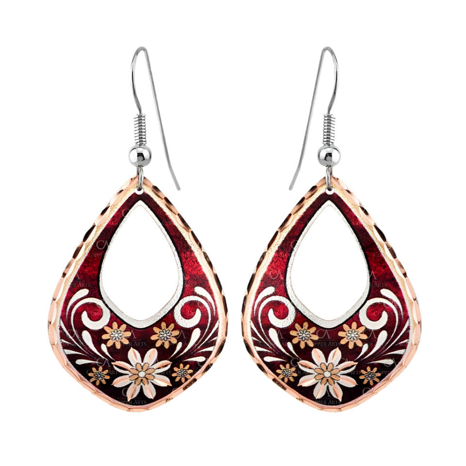 Handcrafted copper teardrop earrings with red and silver floral daisy design, open cut-out center, diamond-cut accents, and hypoallergenic hooks.