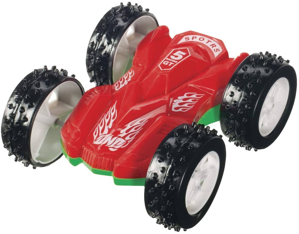A Toy Flip Car featuring a red body with flame decals, large all-terrain black and silver wheels, and "SPOTRS" written on top is powered by a friction pull-back mechanism, making it ready to race into action both indoors and outdoors.