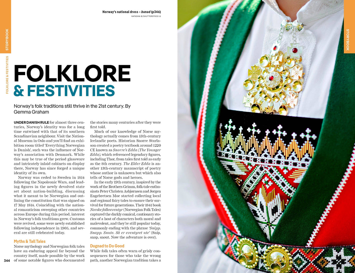 A close-up of a traditional Norwegian folk costume, adorned with intricate embroidery, vibrant hues, and ornate jewelry, displayed next to the “Lonely Planet Norway Northern Lights Safari Far North Hiking & Skiing Oslo Walking Tours Travel Guide” by Hachette Book Group—an evocative scene that captures the spellbinding allure of Norway’s folklore, festivities, and the shimmering Northern Lights celebrated in this must-have travel companion.