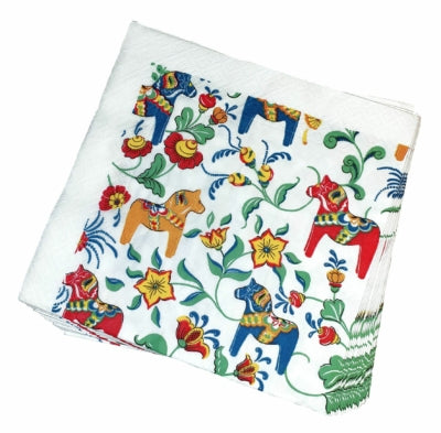 A stack of Leksand Mini Dala Cream napkins featuring vibrant floral patterns and charming Dala horse illustrations from Arvidssons Textil.