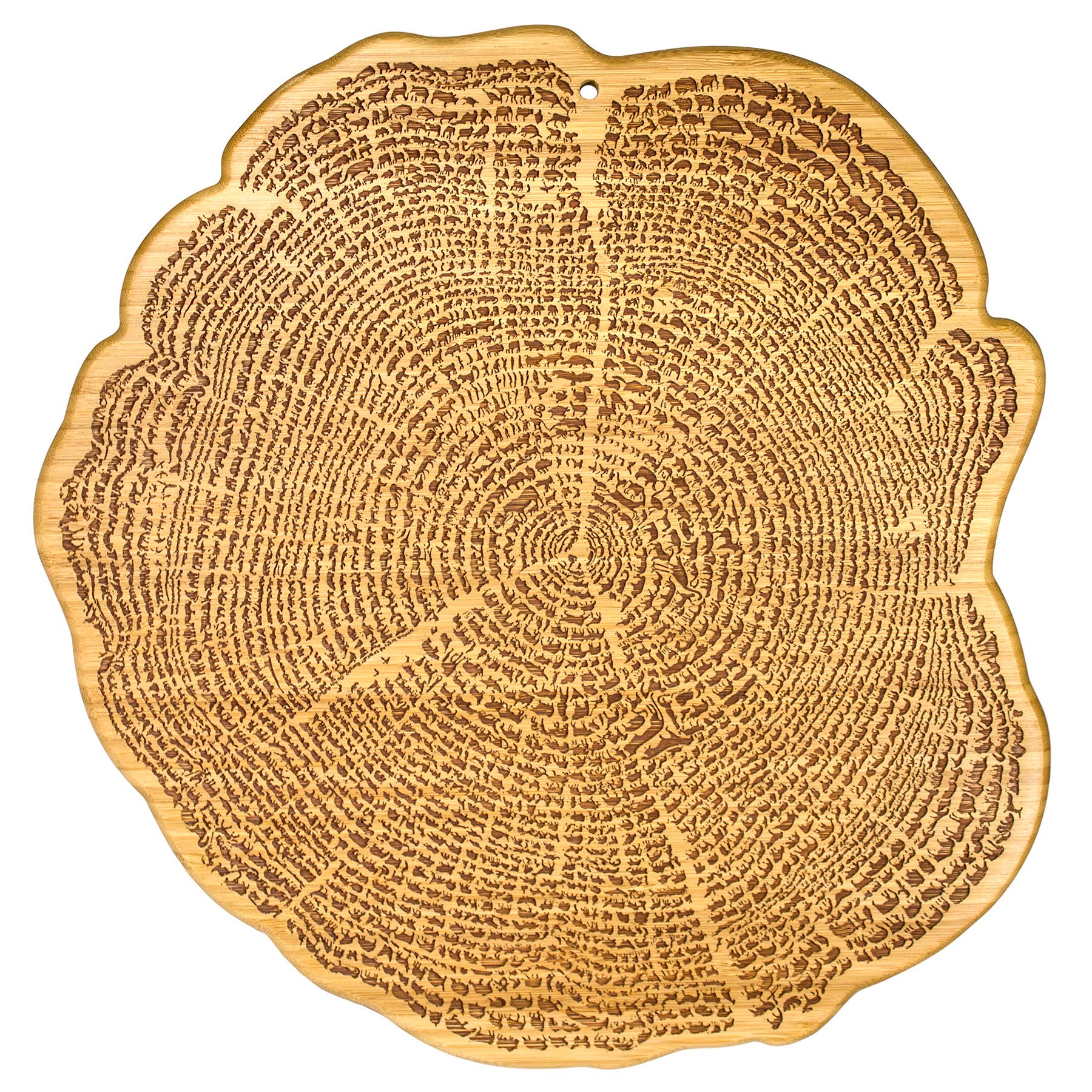 The Tree of Life Bamboo Serving Board is a 13 wooden board shaped like a tree cross-section, featuring visible growth rings and 800+ engraved silhouettes of exotic and endangered animal species.