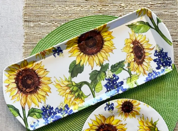 The Sunflower & Bluebonnets Floral Loaf Serving Charcuterie Tray, featuring a shatter-resistant design and sunflower-blue floral pattern, adds charm and durability to your eco-friendly dinnerware collection.