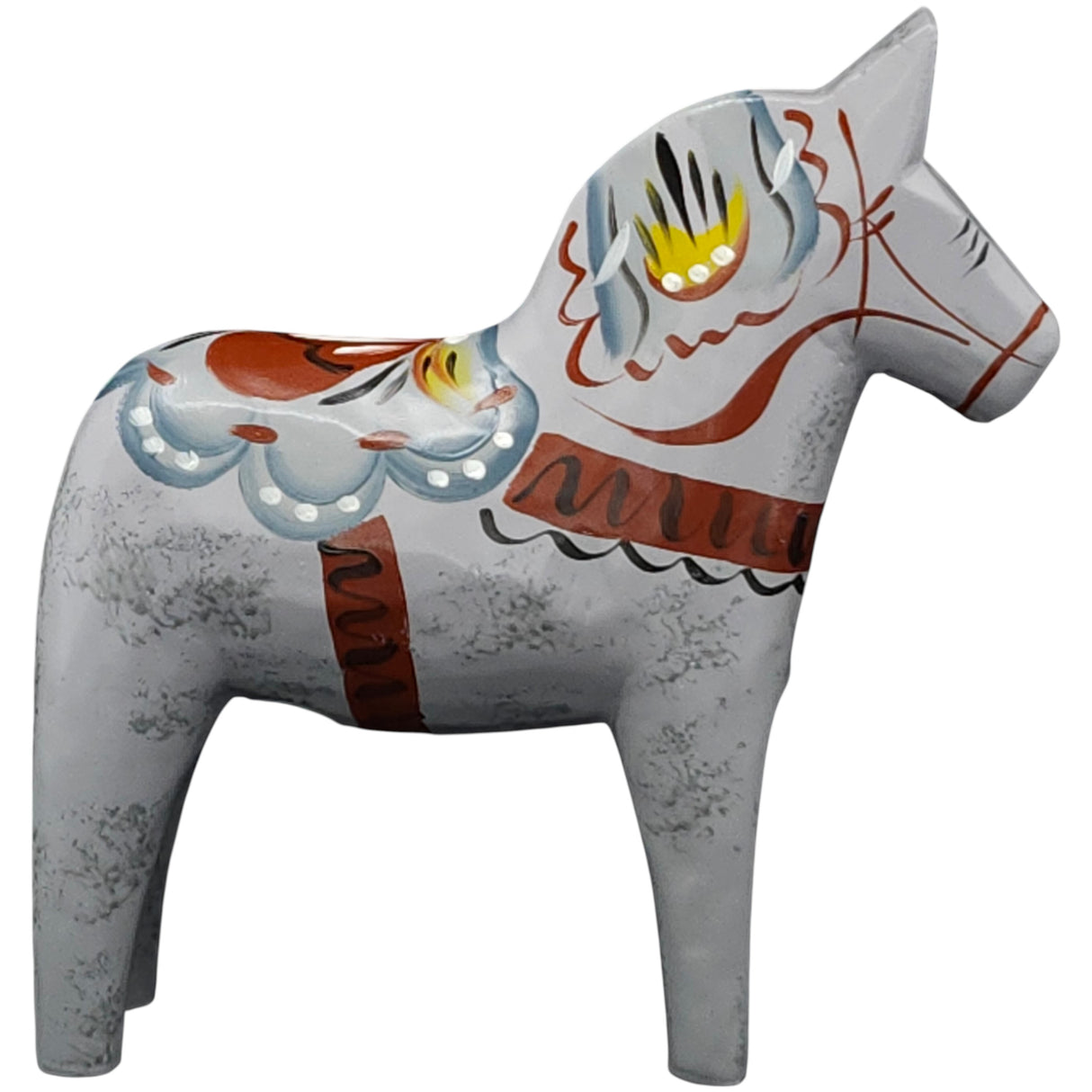 The Dala Horse: "Love Horse" Karlekshast, approx. 13cm (5"), is a hand-carved grey Swedish horse with traditional blue, yellow, red, and white folk patterns—a charming piece of Swedish heritage décor.