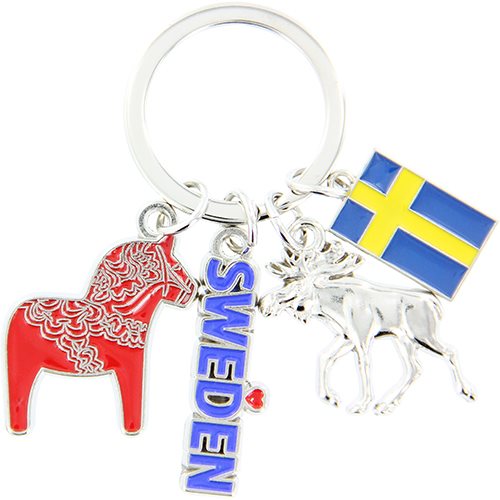 The Keychain: Dala Horse Sweden Moose Flag Metal Keychain features four charms—a red Dala horse, "SWEDEN," a silver moose, and a Swedish flag—on a sturdy metal ring. A perfect Swedish souvenir.