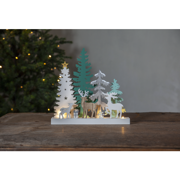 The battery-operated Reinbek Candlestick by Star Trading, in greys and teals, is a charming wooden Christmas decoration with trees, deer, and presents—perfect for indoor display with the soft glow complementing your festive space.
