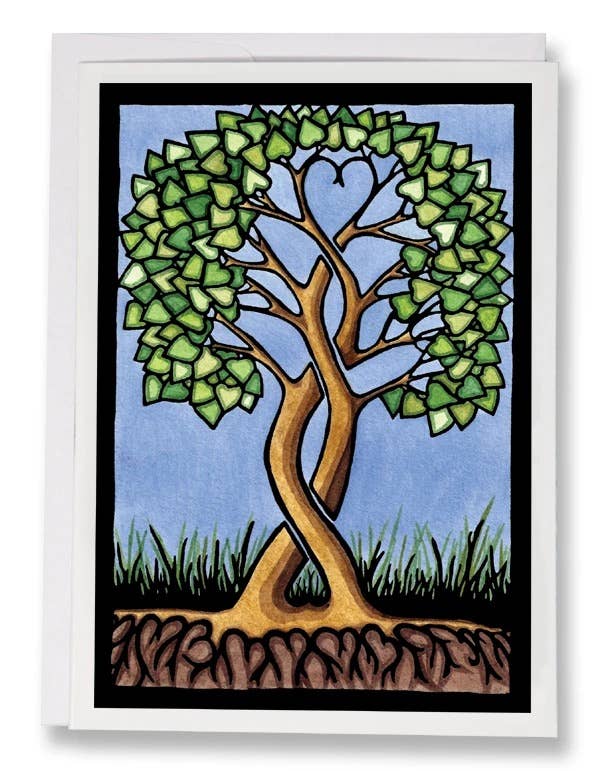 Illustration of two intertwined trees forming a heart with their branches, set against a blue sky and grass with roots. Card: Together Forever Tree by Sarah Angst, 5x7. Part of Sarah Angst Art’s Greeting Card collection. Made in America.