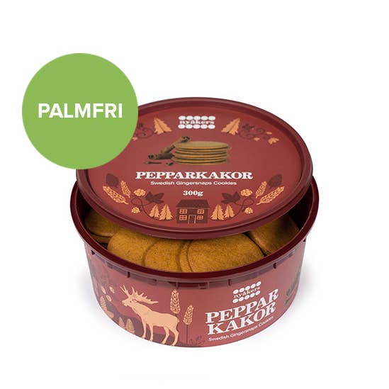 The red Nyakers Pepparkakor Swedish Gingersnap Cookies tub holds tasty cookies, marked with a green PALMFRI circle. This echoes their classic 1952 gingerbread recipe.