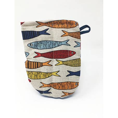 The Fish Oven Mitt is made from linen cotton fabric and features a loop, with a colorful fish pattern on a beige background.