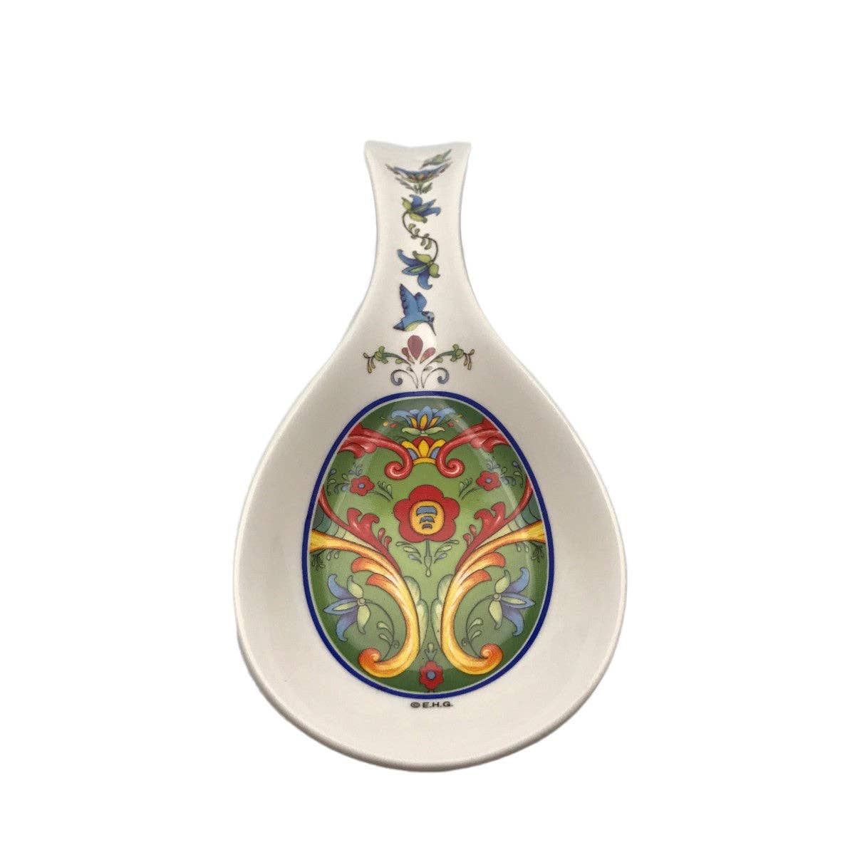 Add Scandinavian charm to your kitchen with the Green Norwegian Rosemaling Ceramic Spoon Rest, featuring colorful floral and scroll patterns in green, red, yellow, and blue on a white background.