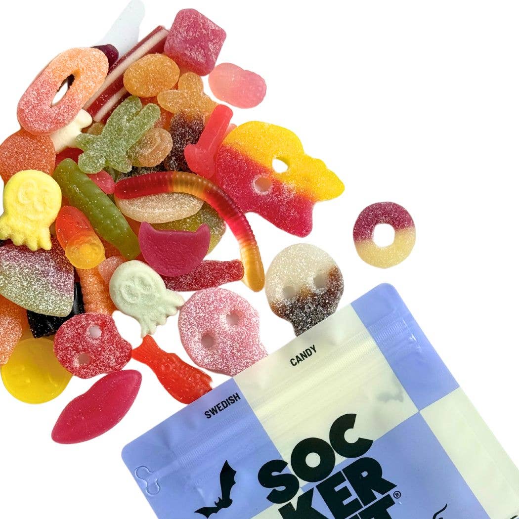 Colorful gummy worms, rings, and fun shapes spill out from a partially visible 8 oz bag labeled "Candy: Spooky Swedish Gummy Mix.