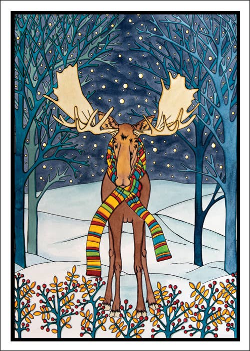 A moose wearing a colorful striped scarf stands in a snowy forest of blue trees with yellow berries and stars above—captured on the 5x7 Holiday Moose greeting card by Sarah Angst, blank inside and includes an envelope.