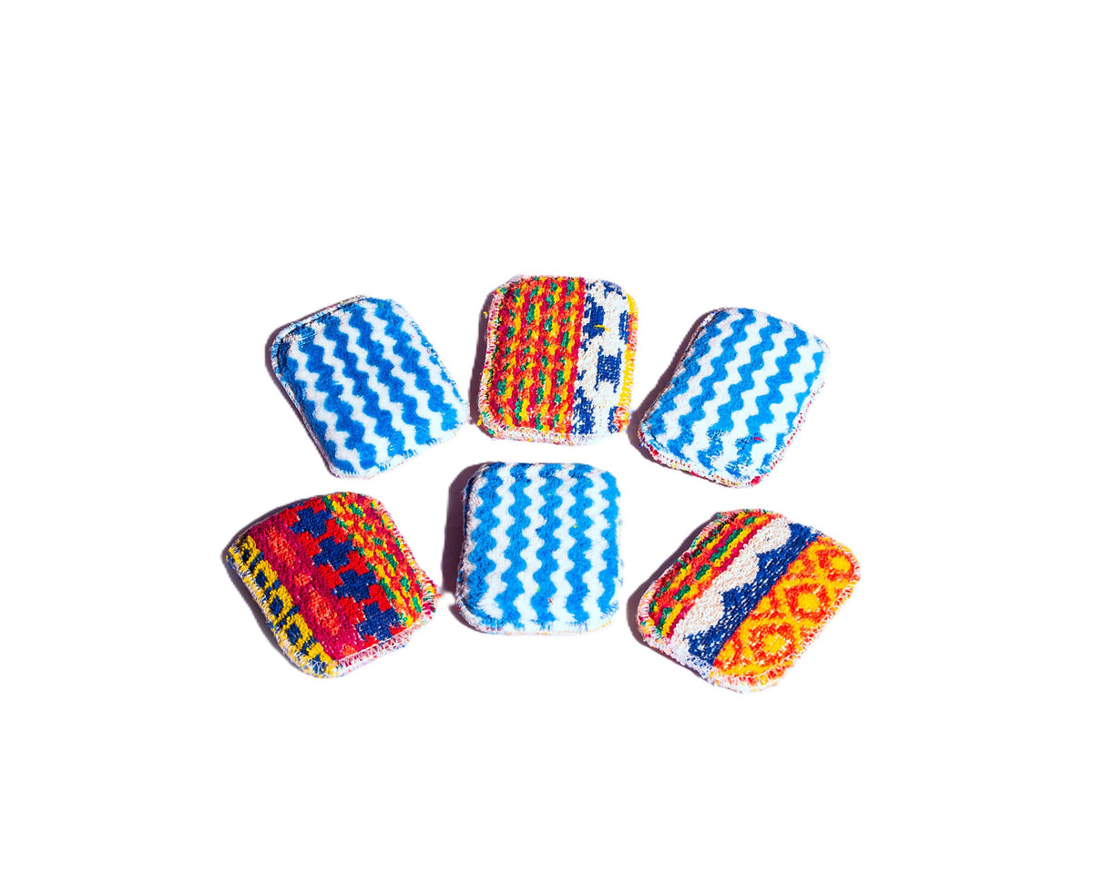 Six Scrub: Scrub & Wipe Plus Sponge pads feature blue and multicolored textured surfaces, arranged on a white background—ideal for long-lasting, multi-purpose cleaning and effortless scrubbing or wiping.