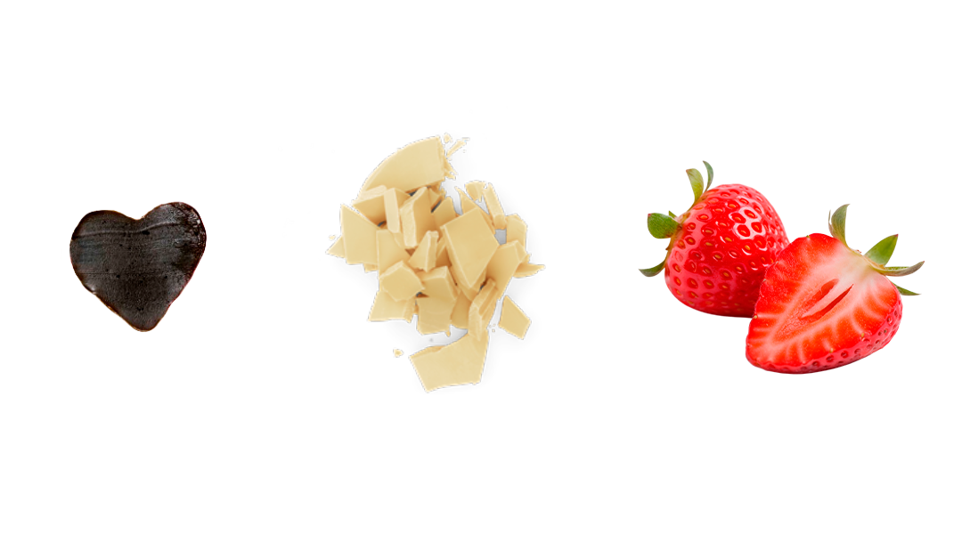 A heart-shaped piece of Lakrids by Bülow Strawberries & Cream Danish chocolate coated licorice, with white chocolate chunks and strawberries, is elegantly displayed—celebrating Danish love and this limited edition treat.