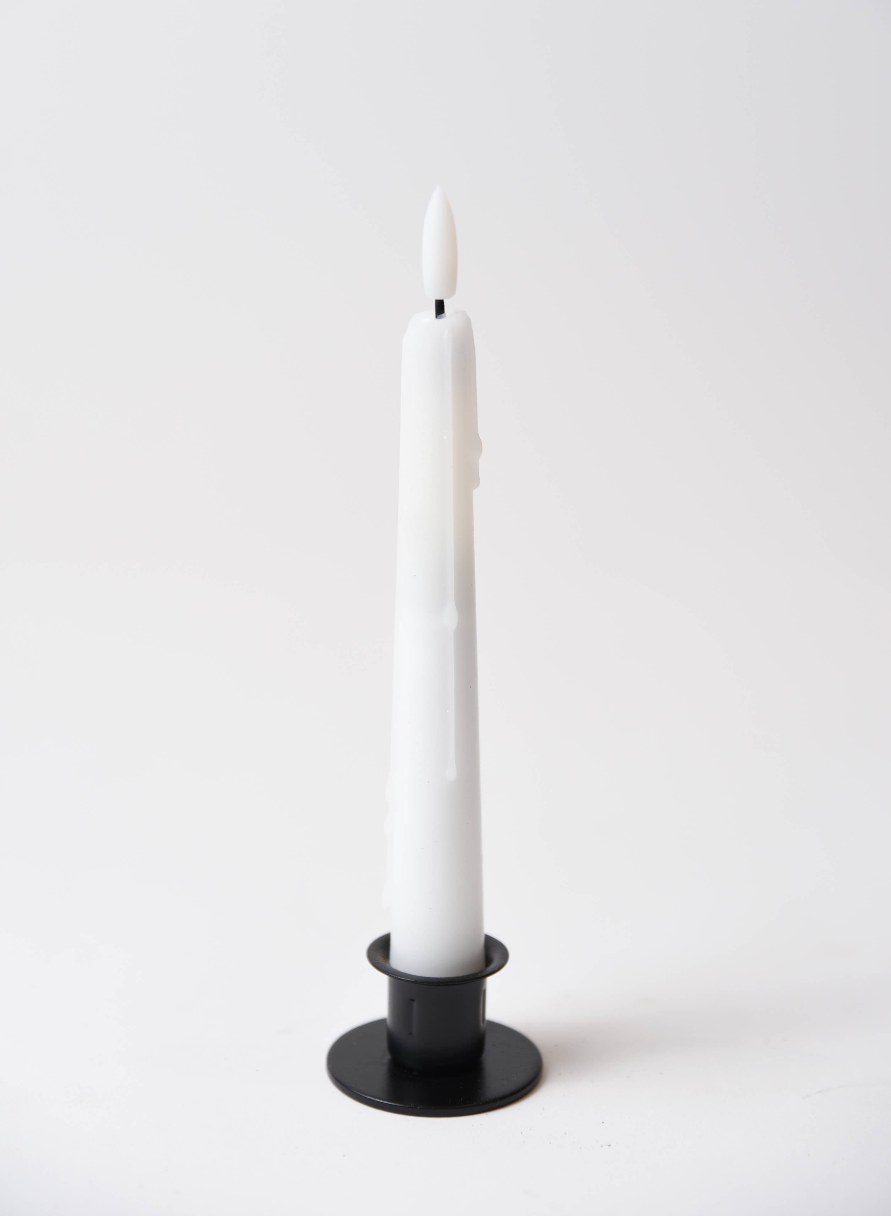 The Holiday Special Realistic Flame Battery Taper: Plain stands upright, unlit, in a black holder against a white background—ideal for elegant holiday table decor.