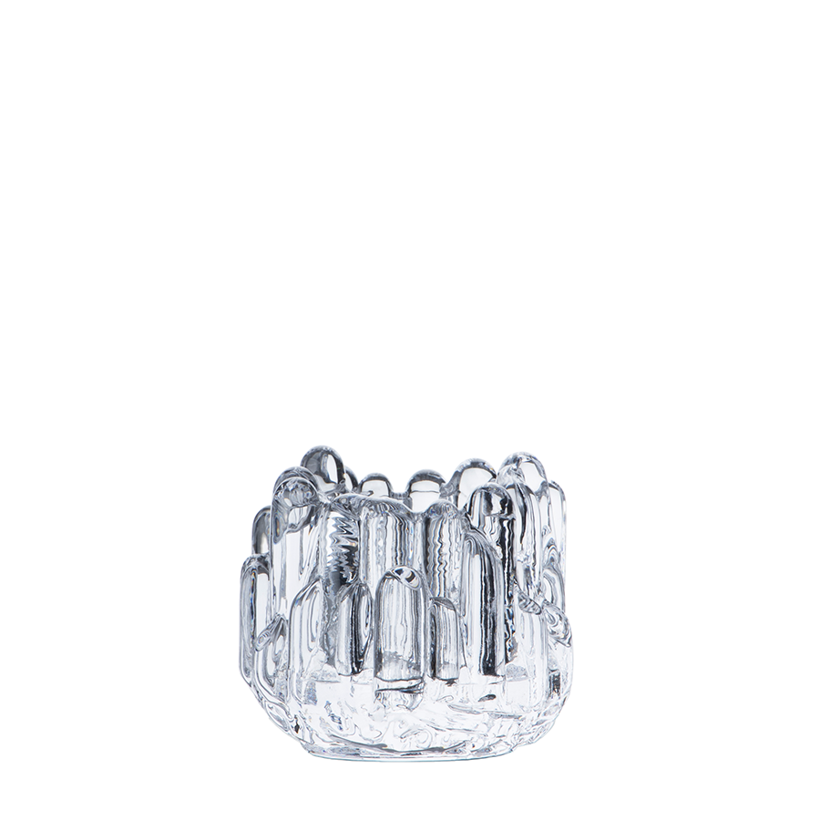 KostaBoda: Polar Votive Clear Small candle holder (H-86mm x D-95mm) features clear glass with vertical ridges, a round base, and slightly scalloped rim, reminiscent of Kosta Boda’s iconic glass sculptures. Displayed on a white background.