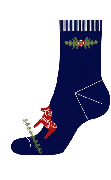 The Suva 1919 Nordic Collection Socks (Blue, Size 41-44) feature a red and white Dala Horse by the toe, green foliage near the top, and white accents on heel and ankle for a striking Scandinavian style.