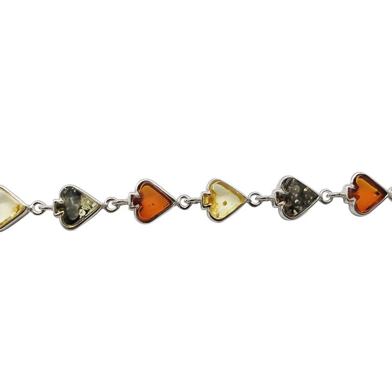 The Multi-Color Baltic Amber .925 Silver Spade Link Bracelet, 7.5" long, showcases heart-shaped amber charms in yellow, orange, and dark green for a striking and elegant accent.
