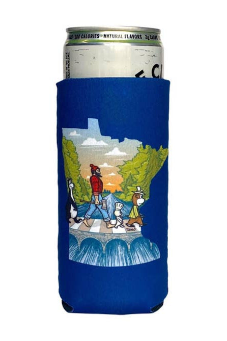 A tall can in a blue Can Cozy: Abbey Road Minnesota State Slim Can Cozy by Adam Turman, featuring cartoon animals and a lumberjack walking on rocks by water, with Minnesota scenery in the background.