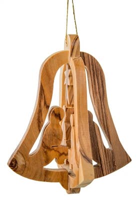 A 3" olive wood ornament shaped like a 3D bell, featuring a carved Nativity scene, handmade in Bethlehem and hanging by a thin golden string.