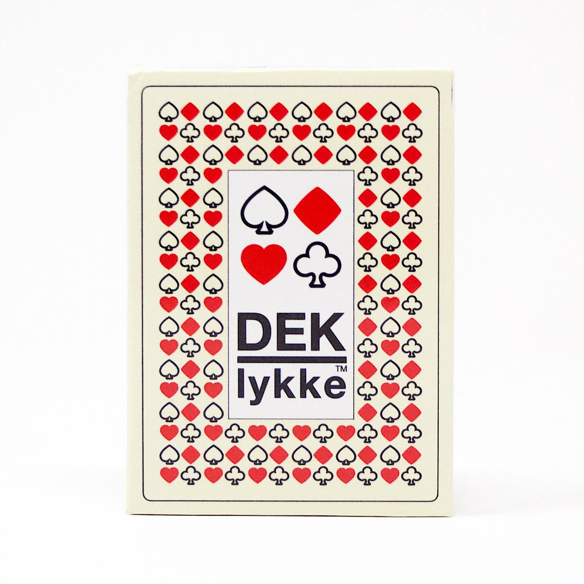 A deck of playing cards featuring a decorative pattern of spades, diamonds, hearts, and clubs surrounding the name "Playing Cards: DEK Lykke (Denmark)," where every card exudes happiness.