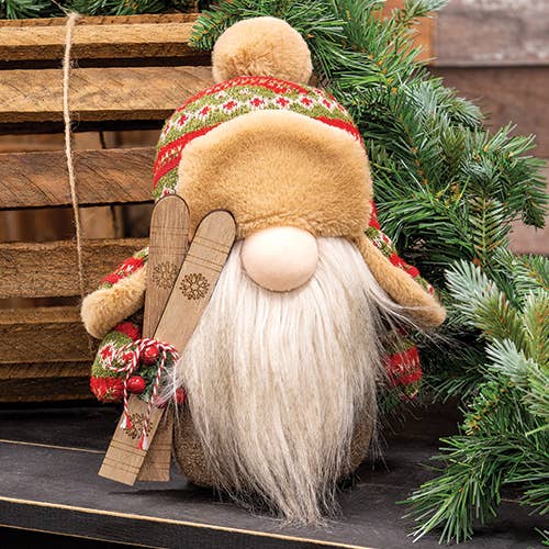 The Gnome: Nordic Knit Tomte - Nisse, a 13" tall gnome with skis, wears a fur hat and patterned sweater—making it the perfect Christmas holiday decoration.