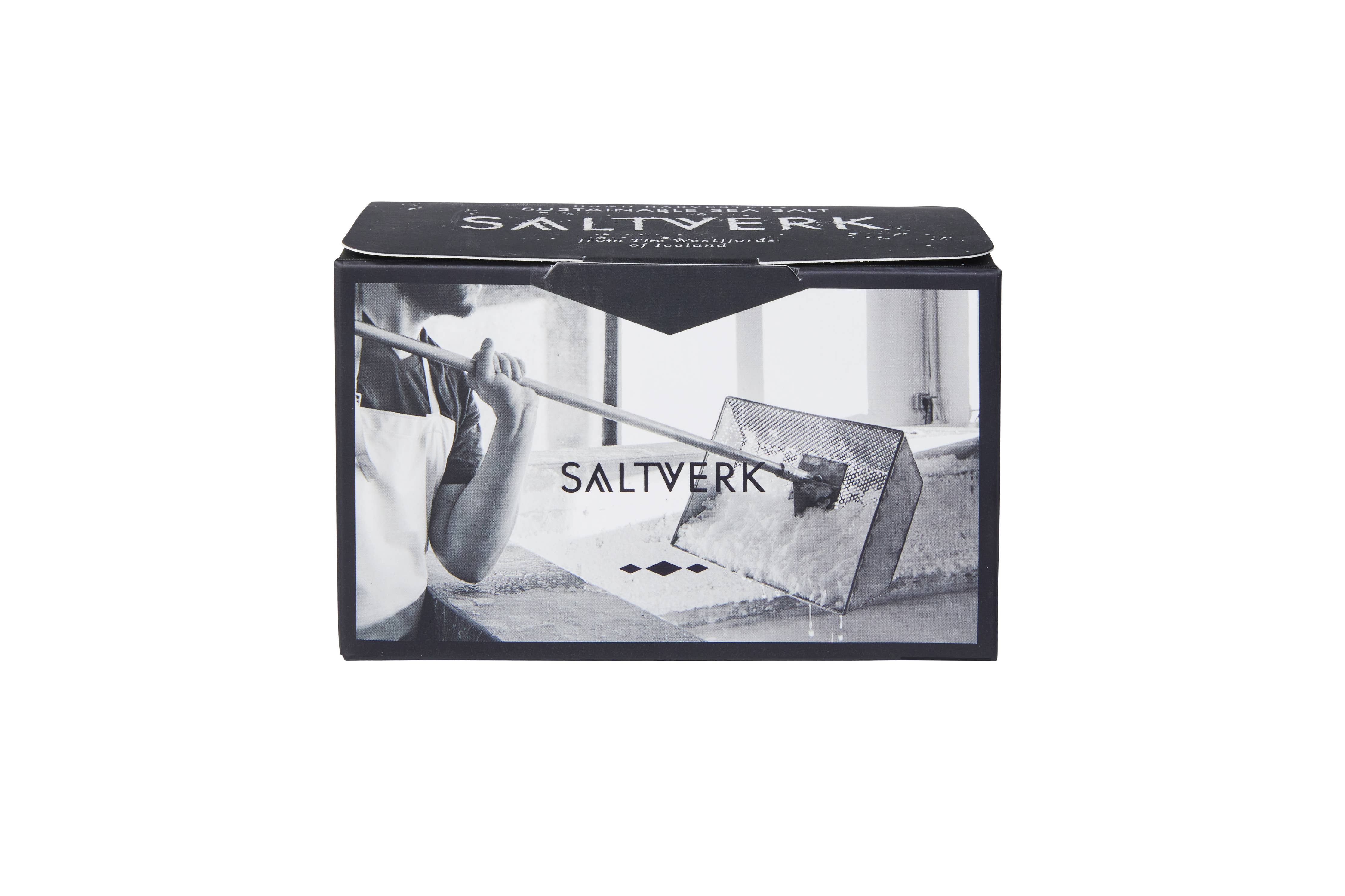 The SALTVERK Gift Set includes Sea Salt and Lava Salt, presented in a box with a black-and-white image of salt harvesting—an ideal sea salt gift set for culinary enthusiasts.