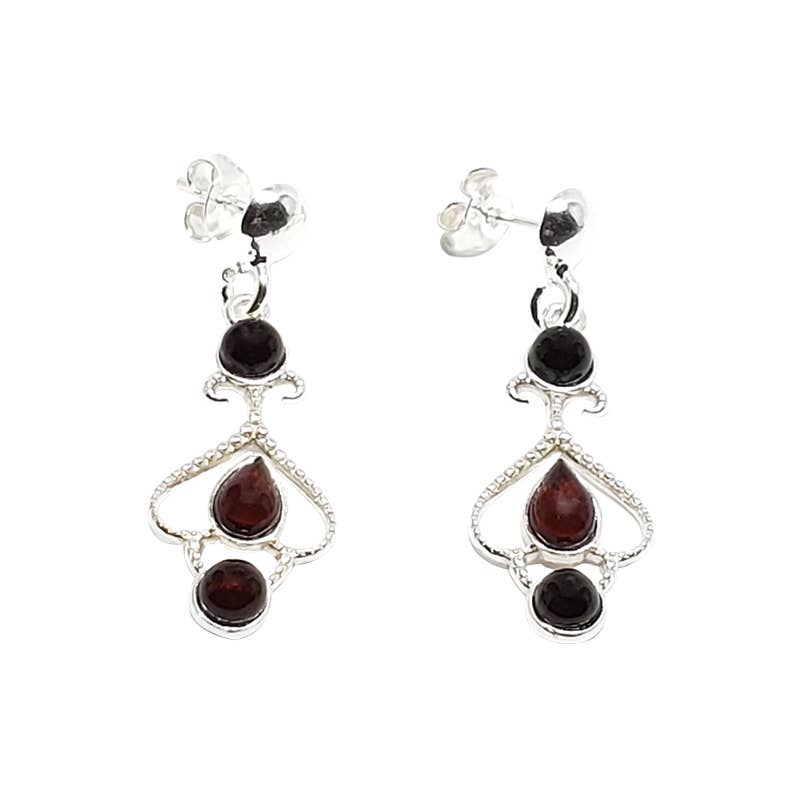 Cherry Baltic Amber Sterling Silver Dangle Earrings featuring three cherry amber gemstones— a teardrop-shaped center stone and round stones at the top and bottom.