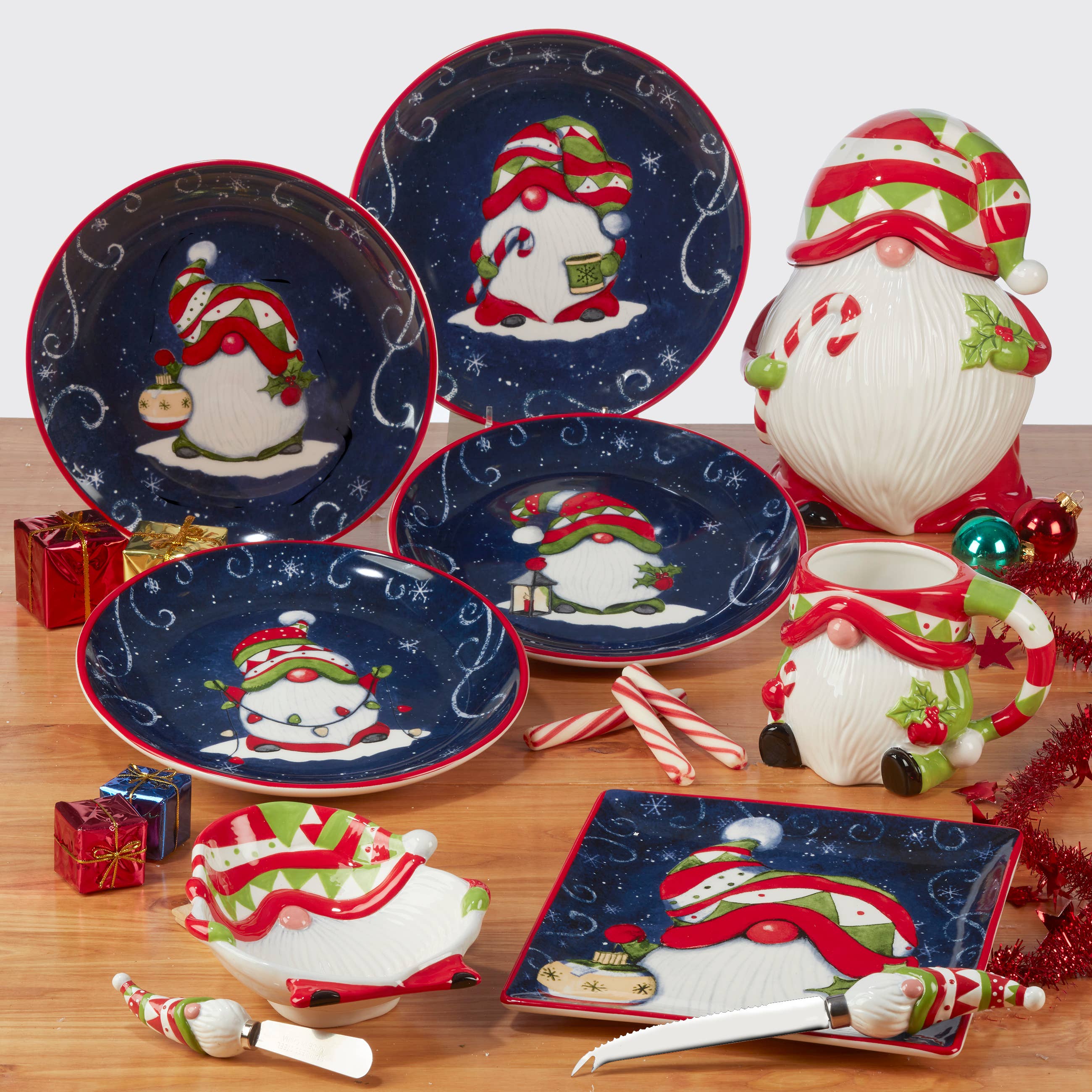 A 9.5 3-D Gnome Cookie Jar from the Gnome Holiday Magic collection, featuring festive Christmas gnome designs by Susan Winget, makes a charming holiday decoration for your kitchen or dining table.
