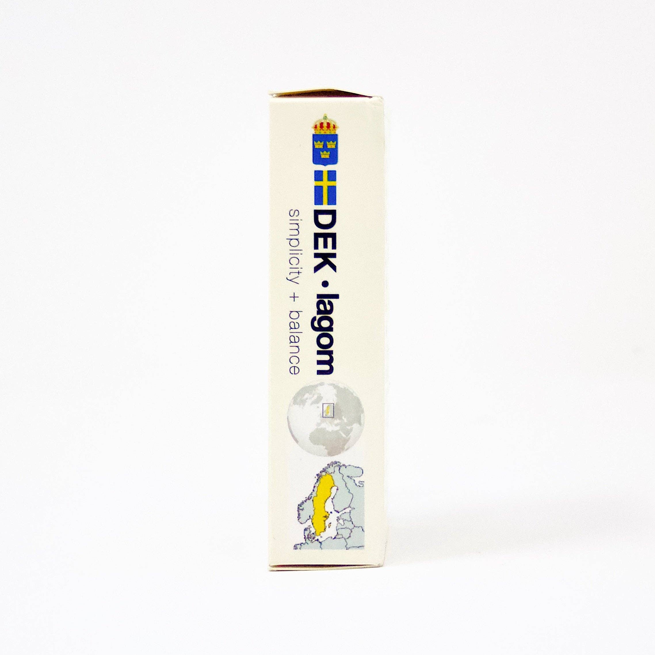 Side view of a box labeled "Playing Cards: DEK Lagom (Sweden)" featuring a Swedish flag, globe, and map of Sweden highlighted in yellow. Text reads "simplicity + balanced living.