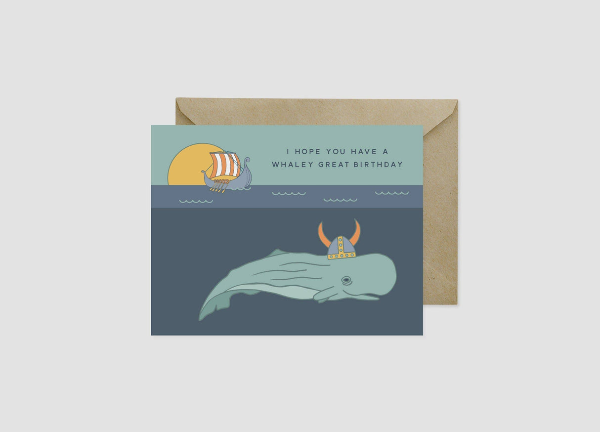 The "I Hope You Have a Whaley Great Birthday" card (4.25x5.5") features a whale in a Viking helmet underwater, a ship above, and comes with a brown envelope—perfect for sending fun Scandinavian birthday wishes.