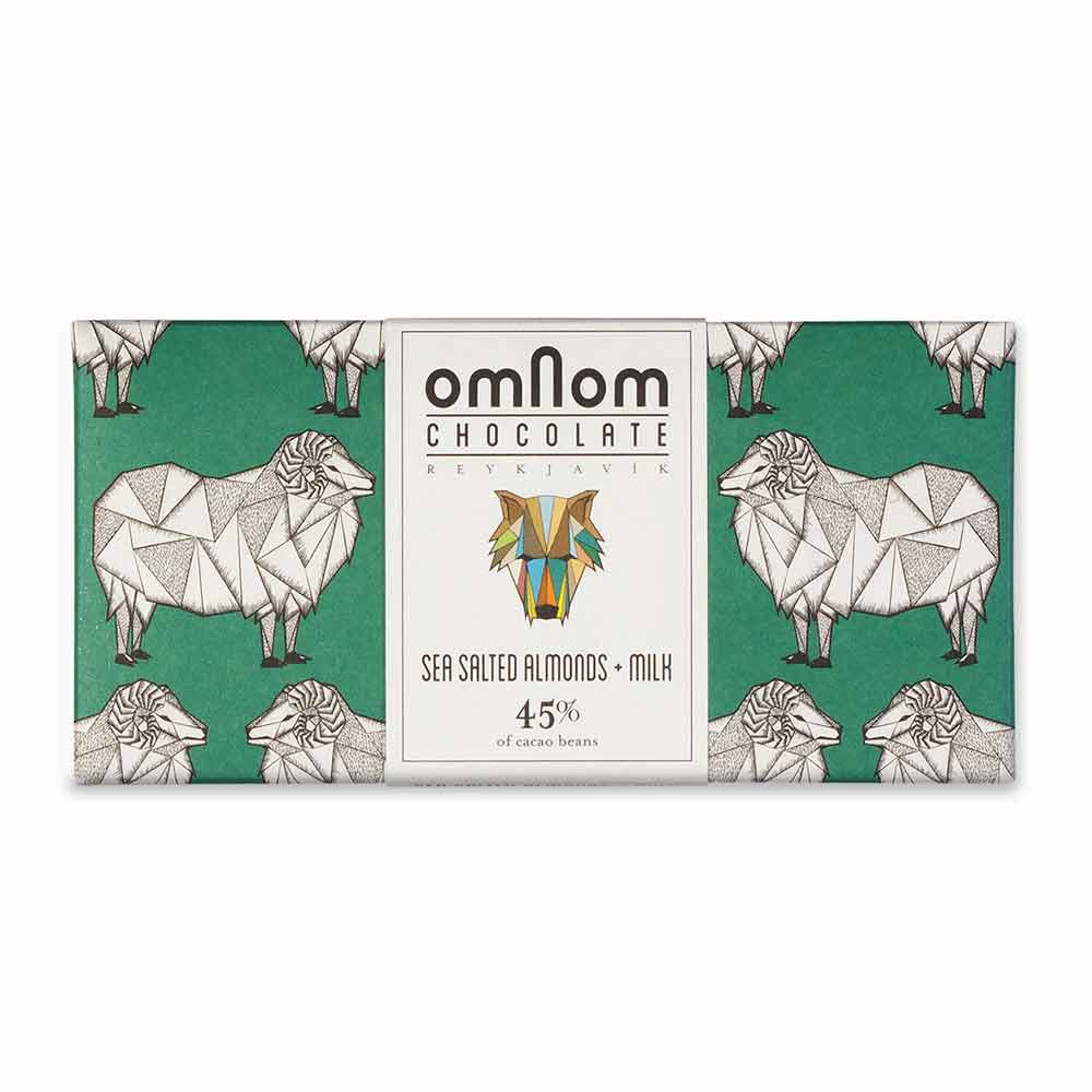 A chocolate bar with a geometric sheep design on green, labeled Candy: OmNom Chocolate Reykjavik Sea Salted Almonds 60g.