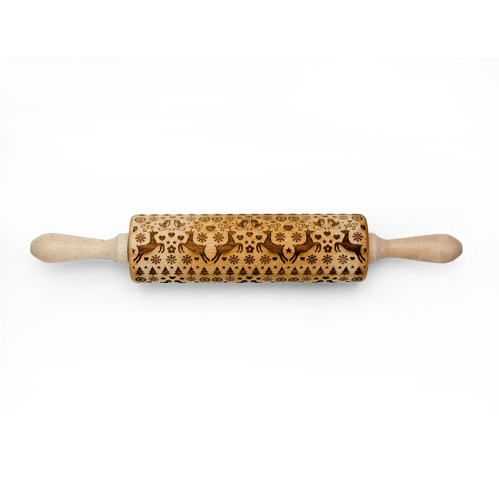 This artisanal rolling pin, inspired by Scandinavian design, is beautifully engraved with delightful reindeer, birds, and tree motifs. Ideal for crafting seasonal delights, the Reindeer Birds & Trees Embossing Rolling Pin infuses a touch of holiday spirit into your baking.