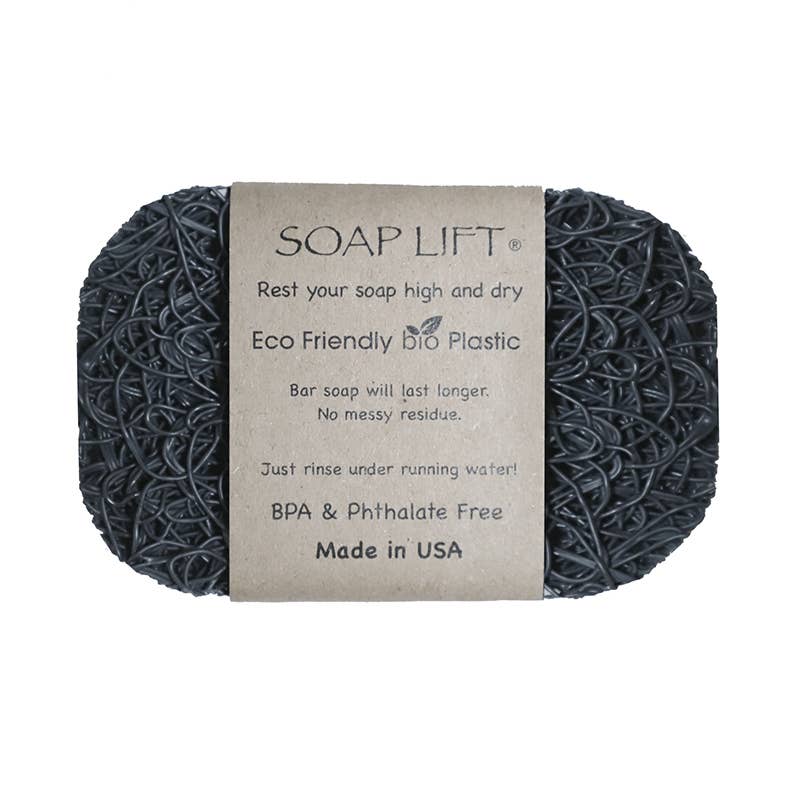 The Soap Lift: Soap Saver in dark gray is crafted from eco-friendly bioplastic and features a label highlighting its easy-rinsing capability and its BPA & phthalate-free formulation. Proudly made in the USA, this soap saver helps your bar last longer while remaining environmentally friendly.