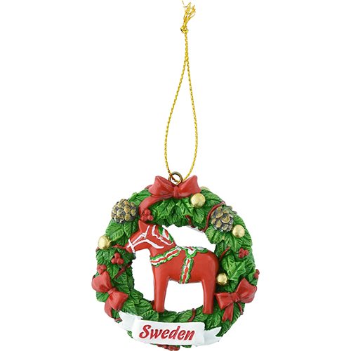 This delightful Christmas tree pendant, named "Dalahäst Sweden," features a wreath design adorned with a red Dala horse, elegantly marked with the inscription "Sweden" at its base.