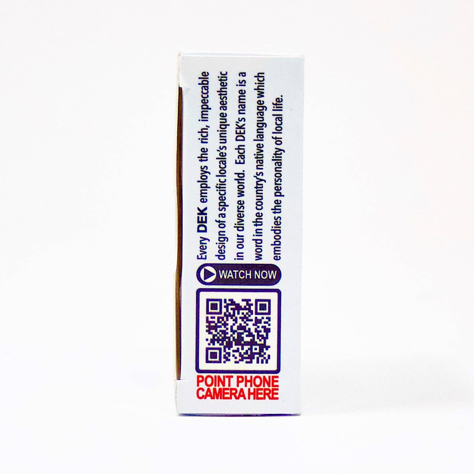 Side view of the Playing Cards: DEK Sisu (Finland) box showcasing text about DEK and a QR code with instructions to point your phone camera here. The design captures the Finnish concept of resilience, emphasizing determination in every detail.