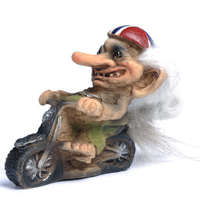 The NyForm Troll on Motorcycle showcases a classic Norwegian design with vibrant white hair, energetically cruising on a miniature bike. It dons a red and blue helmet and displays an exaggerated facial expression, adding whimsical charm to any collection.