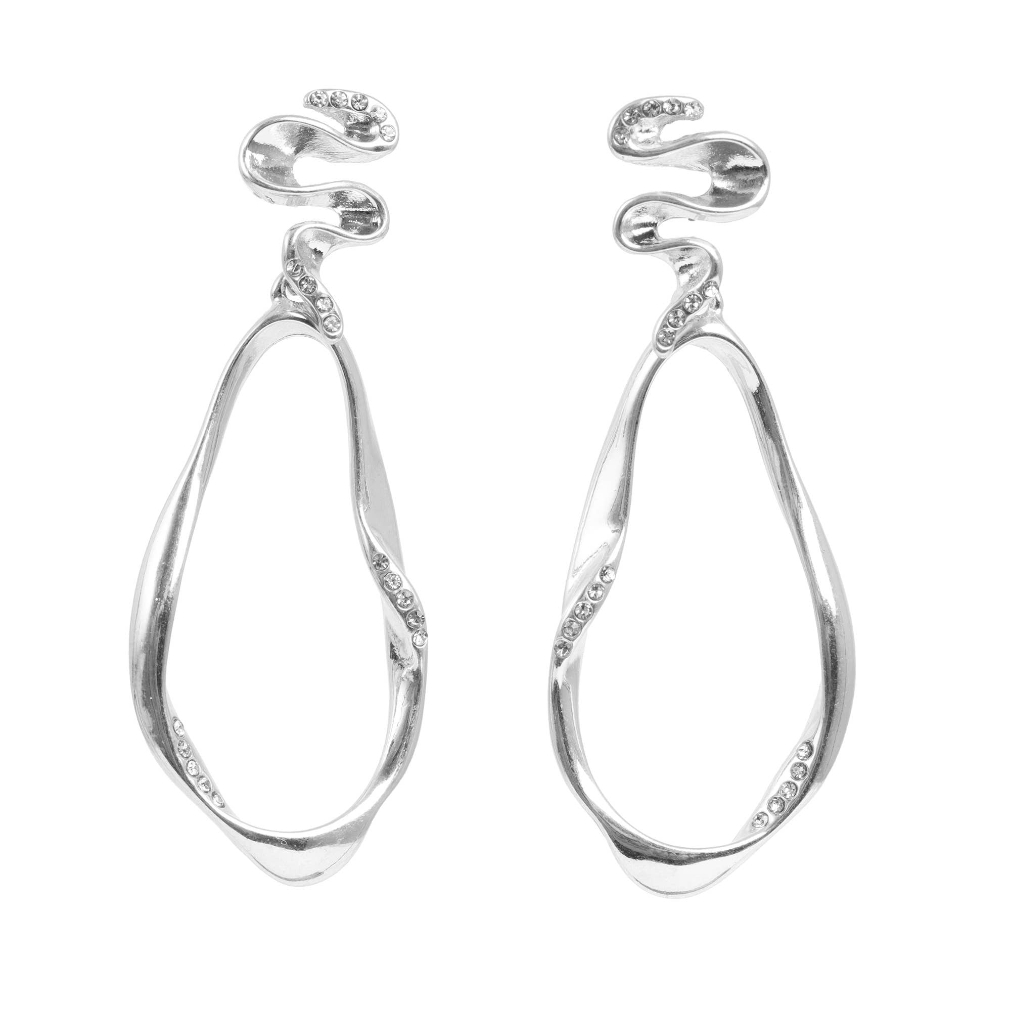 The Blowing Ribbon Silver Dangle Earrings by A&C Oslo feature abstract wavy open ovals, resembling flowing ribbons, with small stones set along the curves.