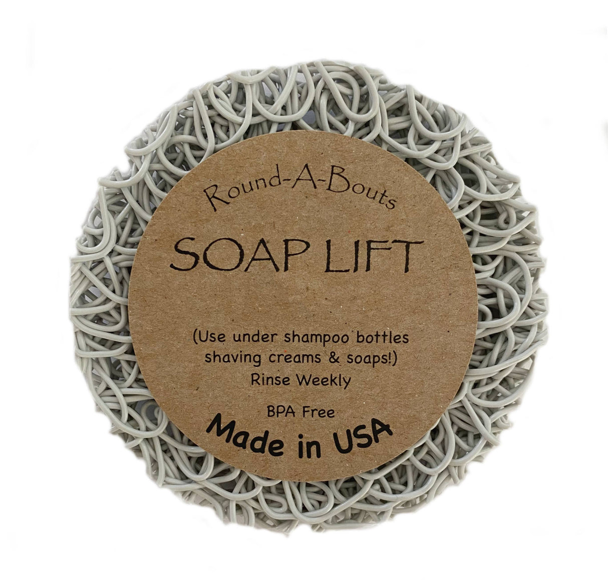 Explore the Soap Lift: Soap Saver Round A Bout - Mist, Light Gray, featuring a circular shape with a curly pattern, made from multi-directional bioplastic. This BPA-free product is crafted in the USA and is perfect for placing under soap bars, shampoo bottles, or shaving creams to help organize your shower shelves with ease.