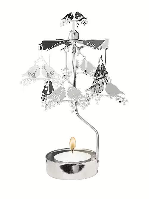 The Pluto Design Angel Chime Robin Rotary Candle Holder in silver features hanging robin ornaments and spins by tealight heat—an ideal, charming addition to Scandinavian decor.