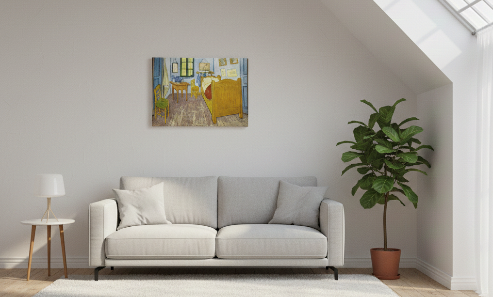 A modern living room with a light gray sofa, small white lamp, potted plant, and the "Artwork: Bedroom in Arles Vincent Van Gogh 1853 - 1890 Print on Canvas" displayed on the wall beneath a skylight.