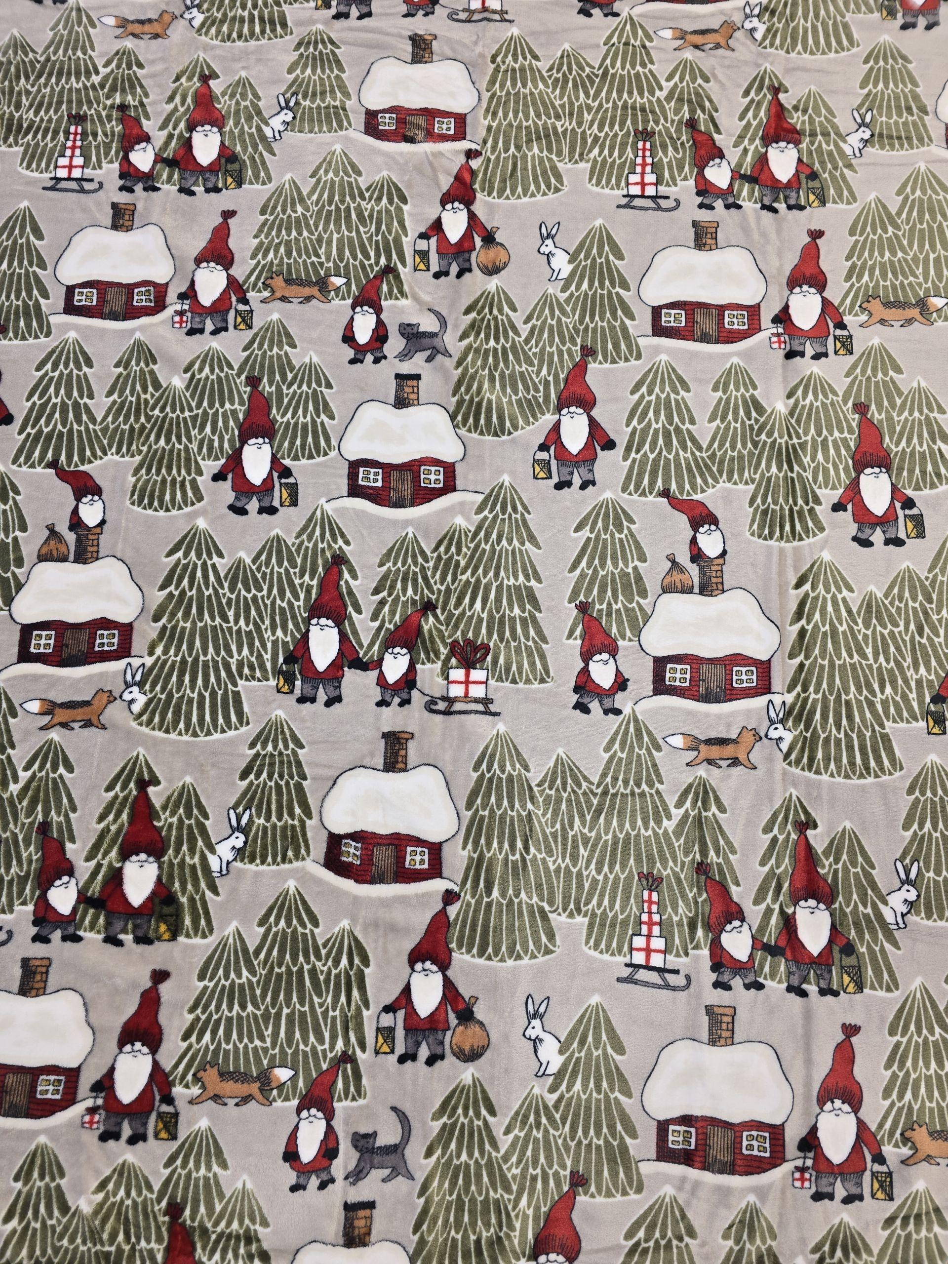 The Tomtehus Fleece Throw Blanket (51" × 67") features a Scandinavian-inspired forest gnome design with gnomes, evergreen trees, snowy cabins, rabbits, and foxes on a beige background.