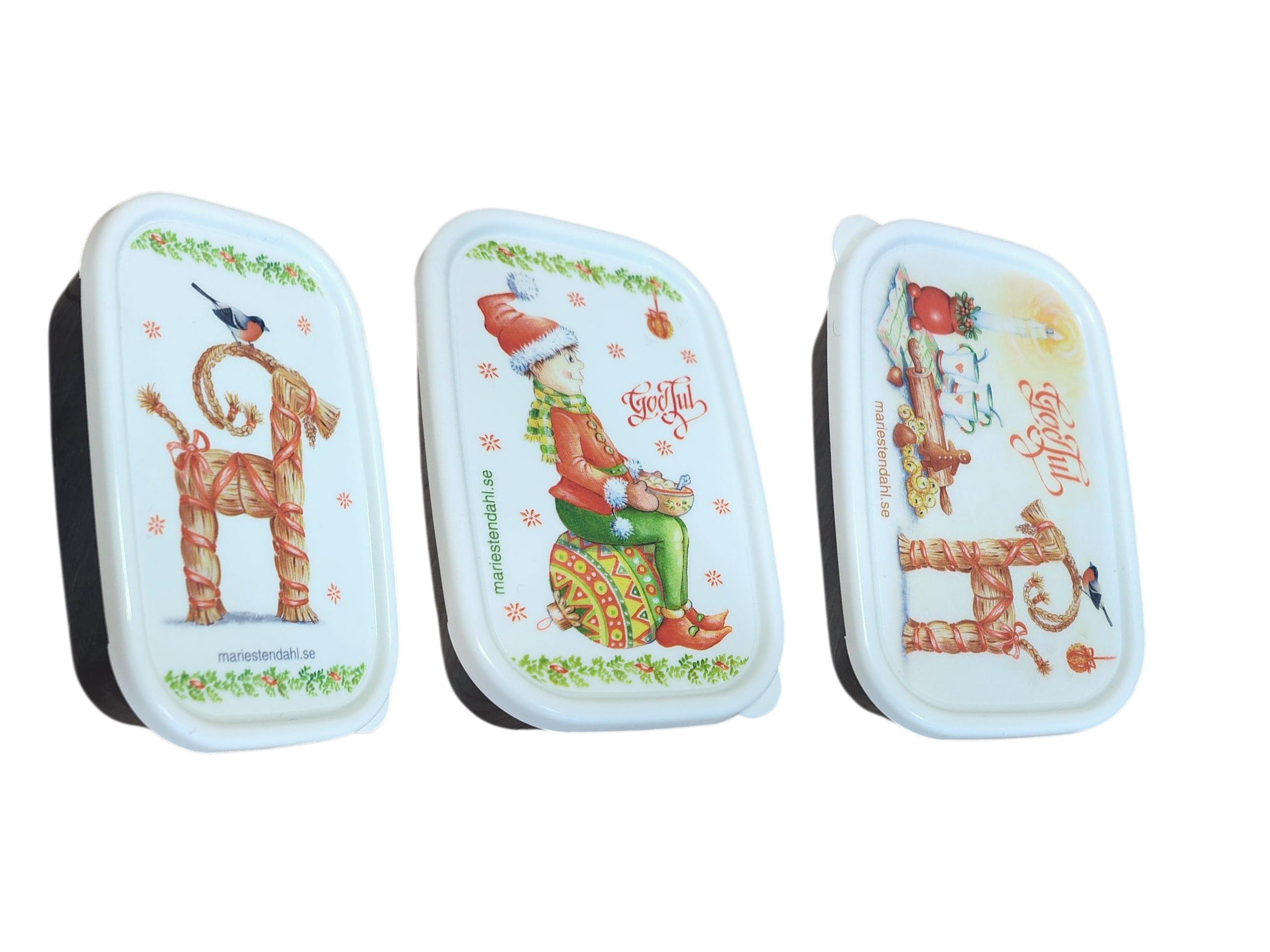 The Mini Christmas Box Container with Marie Stendahl designs features three rectangular boxes with white lids—a straw goat, a gnome, and festive greetings—for charming Swedish holiday décor.