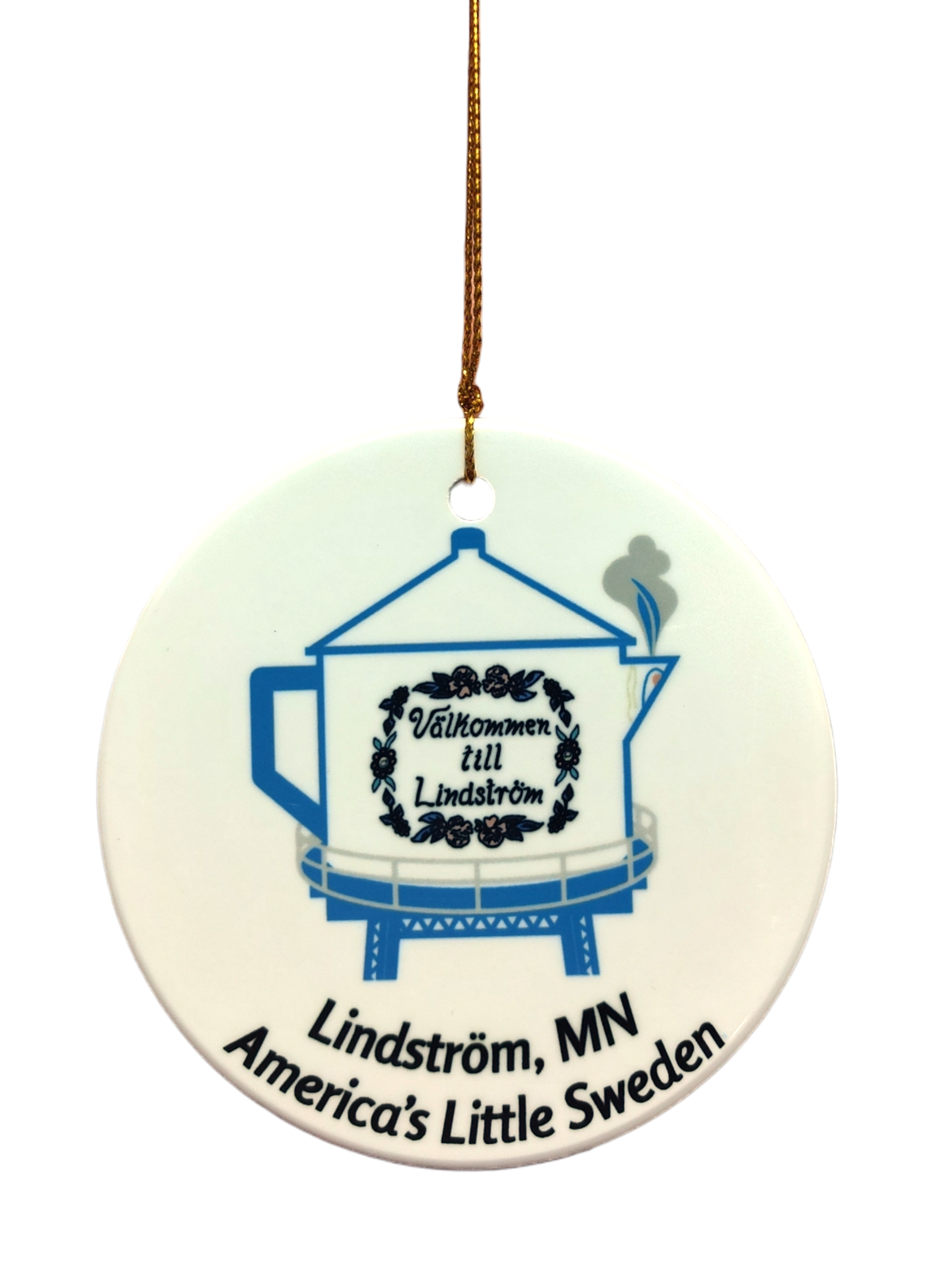 The "Ornament: Valkommen till Lindstrom Ceramic Ornament" is a round ceramic ornament with a blue coffee pot, Swedish text, and “Lindström, MN America’s Little Sweden”—a charming keepsake honoring Scandinavian heritage.