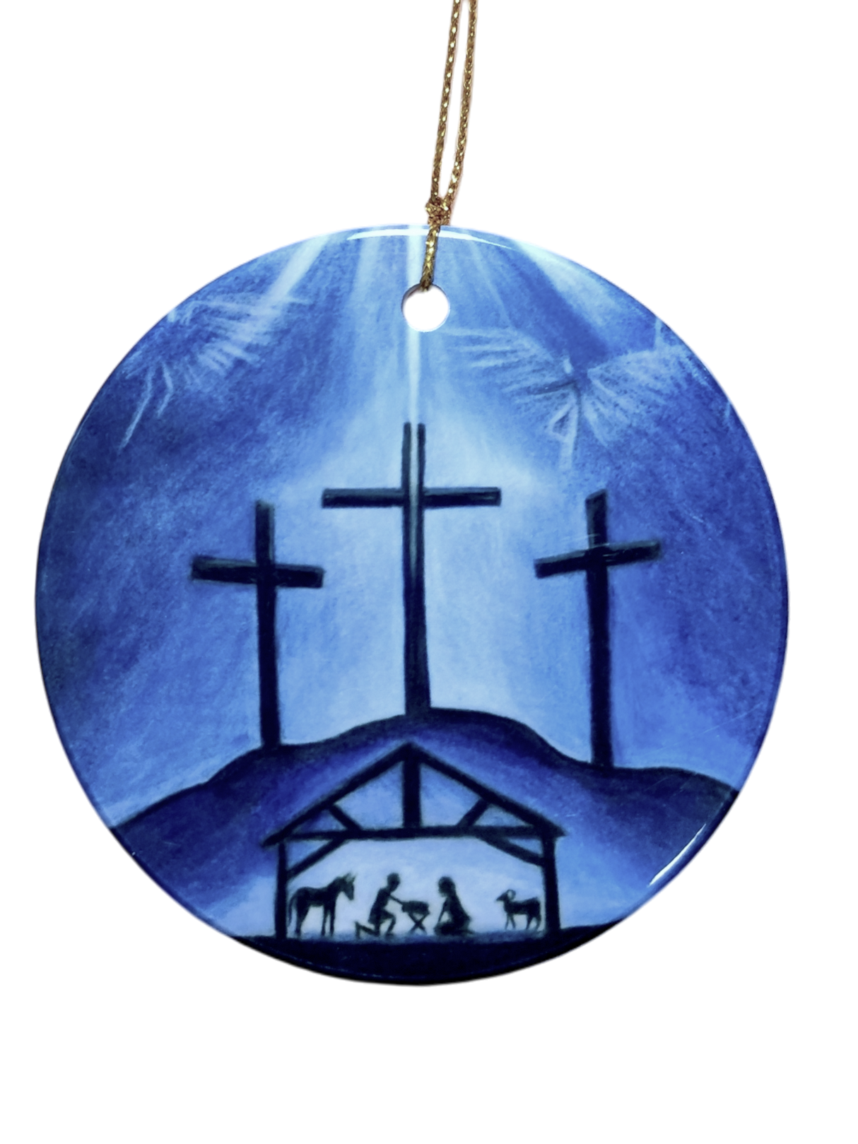 The Ornament: Blue Crosses Ceramic Ornament features three crosses on a hill above a nativity scene, set against a blue background and finished with a gold hanging string—a meaningful religious decoration for your Christmas tree.