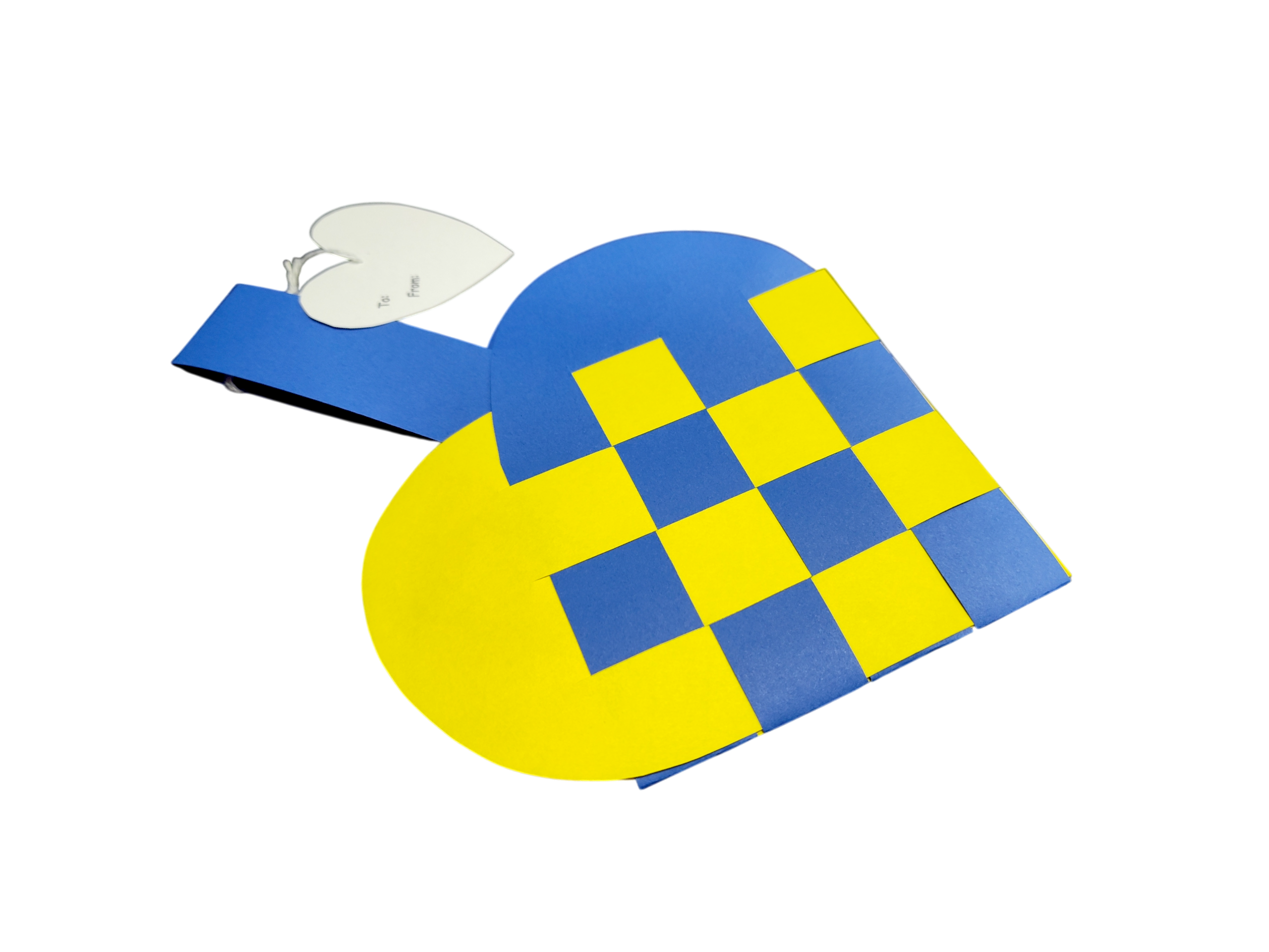 The Card: Swedish Flag Traditional Scandinavian Handwoven Paper Basket Heart features blue and yellow weaving, a handle, and a white heart-shaped tag, shown on a plain white background.